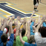 The crowd goes nuts as the Muskie basketball team scores their 10th point against Edgewood.