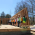 Habitat for Humanity volunteers joined forces to raise and support a wall while it was installed.